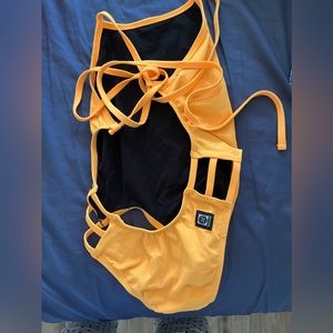 Jolyn, tie back, solid, one piece